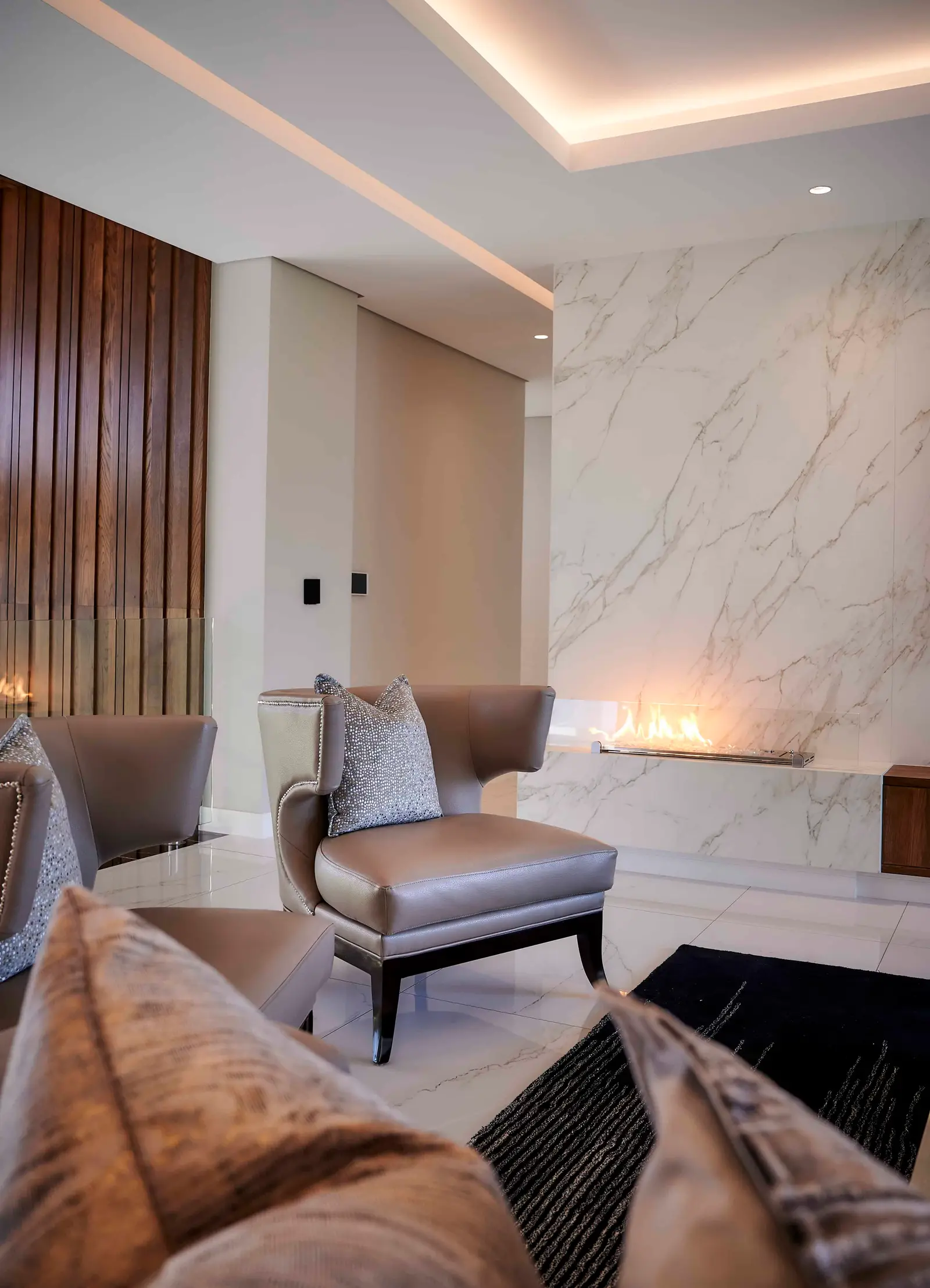 Sophisticated bedroom with pendant lighting and neutral tones by Interior Designer Johannesburg.
