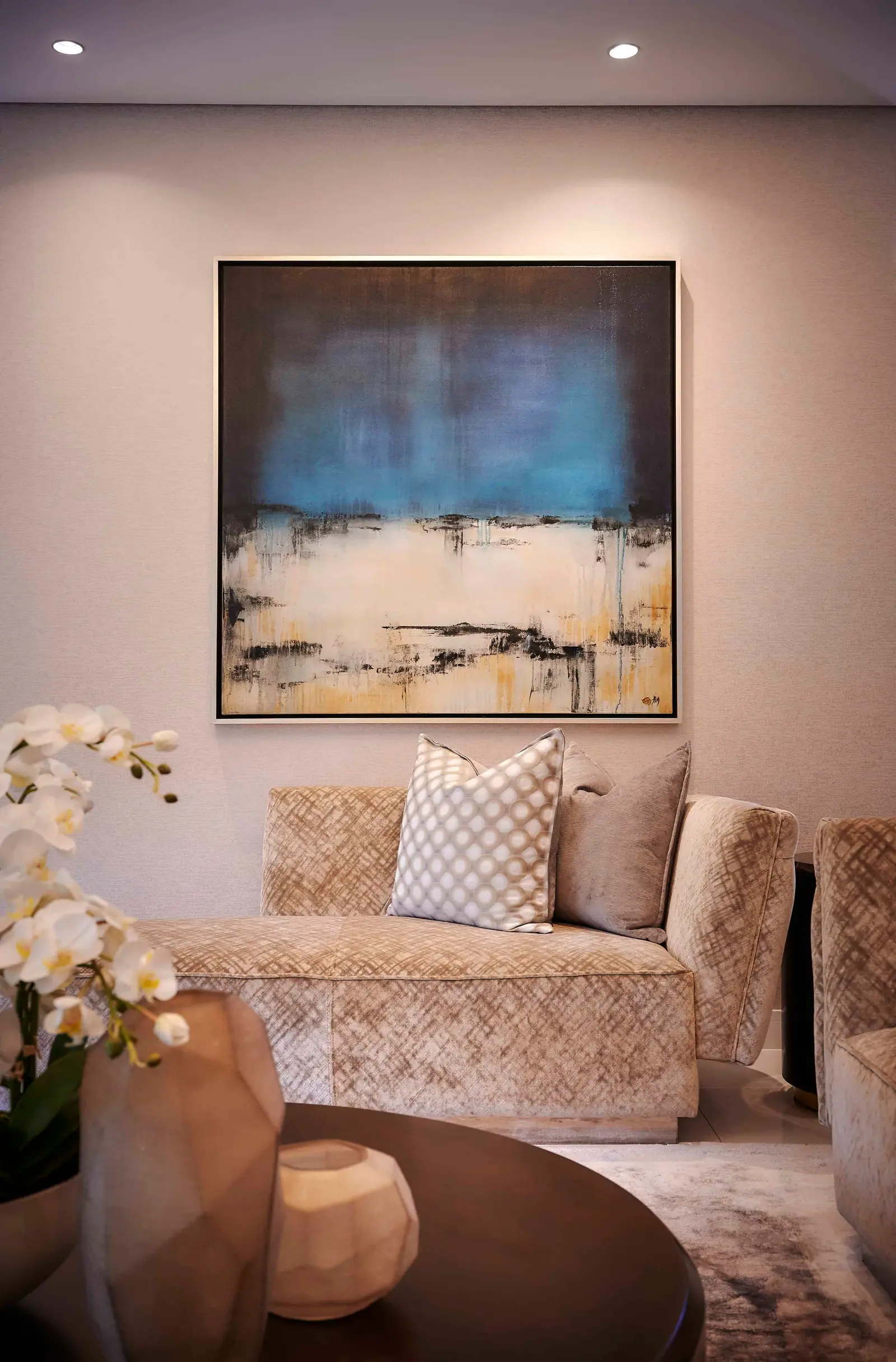 Contemporary lounge with accent wall and decorative elements styled by Interior Designer Johannesburg.