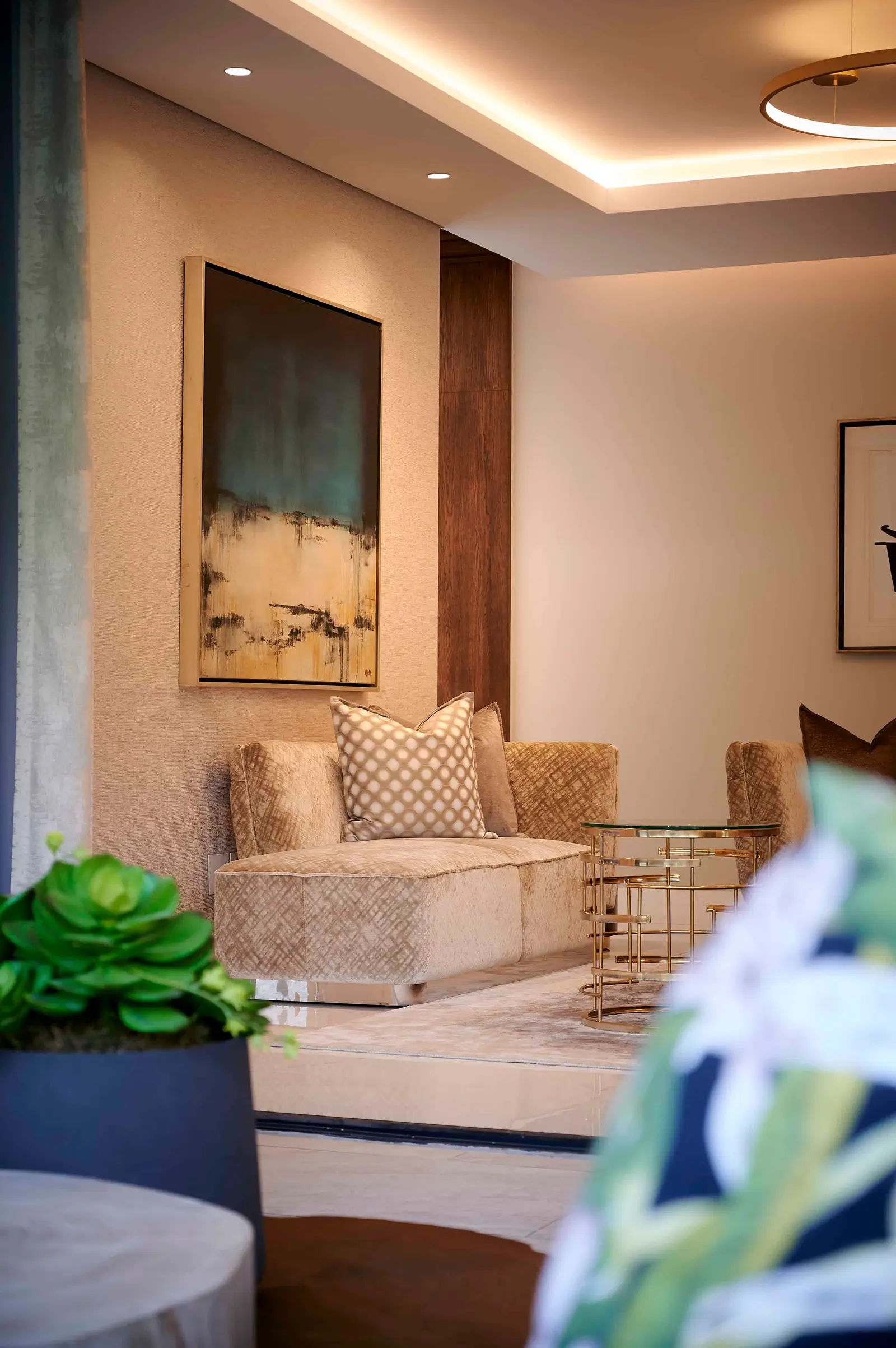 Contemporary lounge with accent wall and decorative elements styled by Interior Designer Johannesburg.