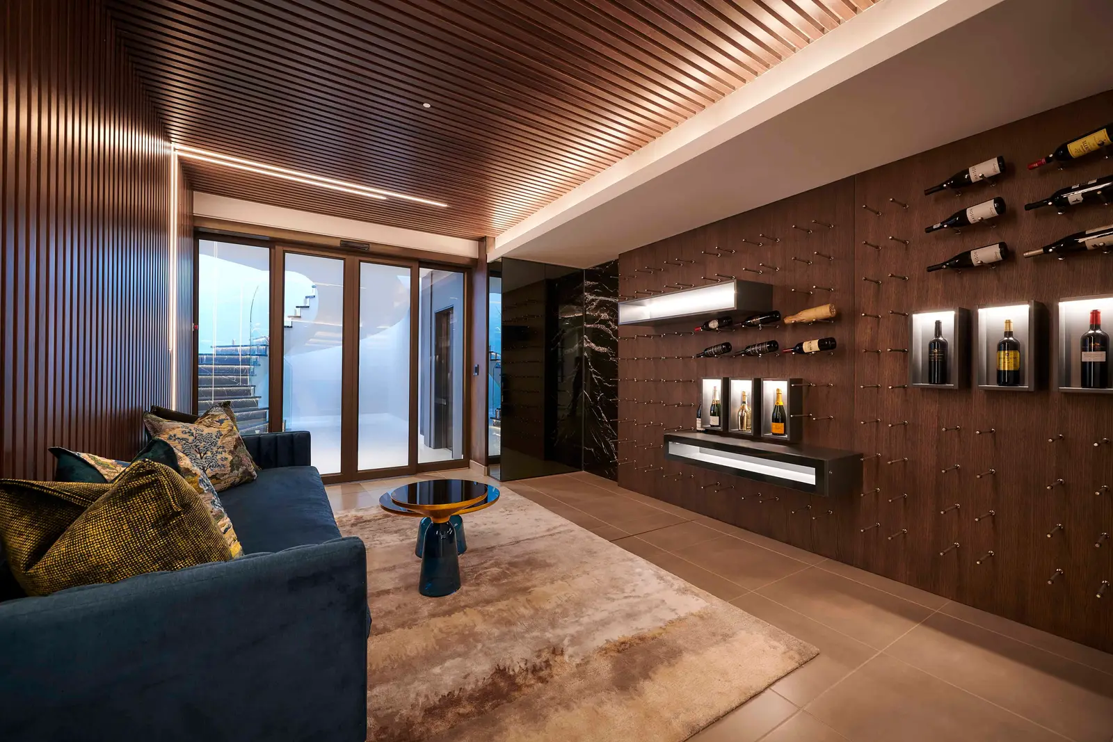 Warm‑toned mancave lounge with seating and artwork curated by Interior Designer Johannesburg.