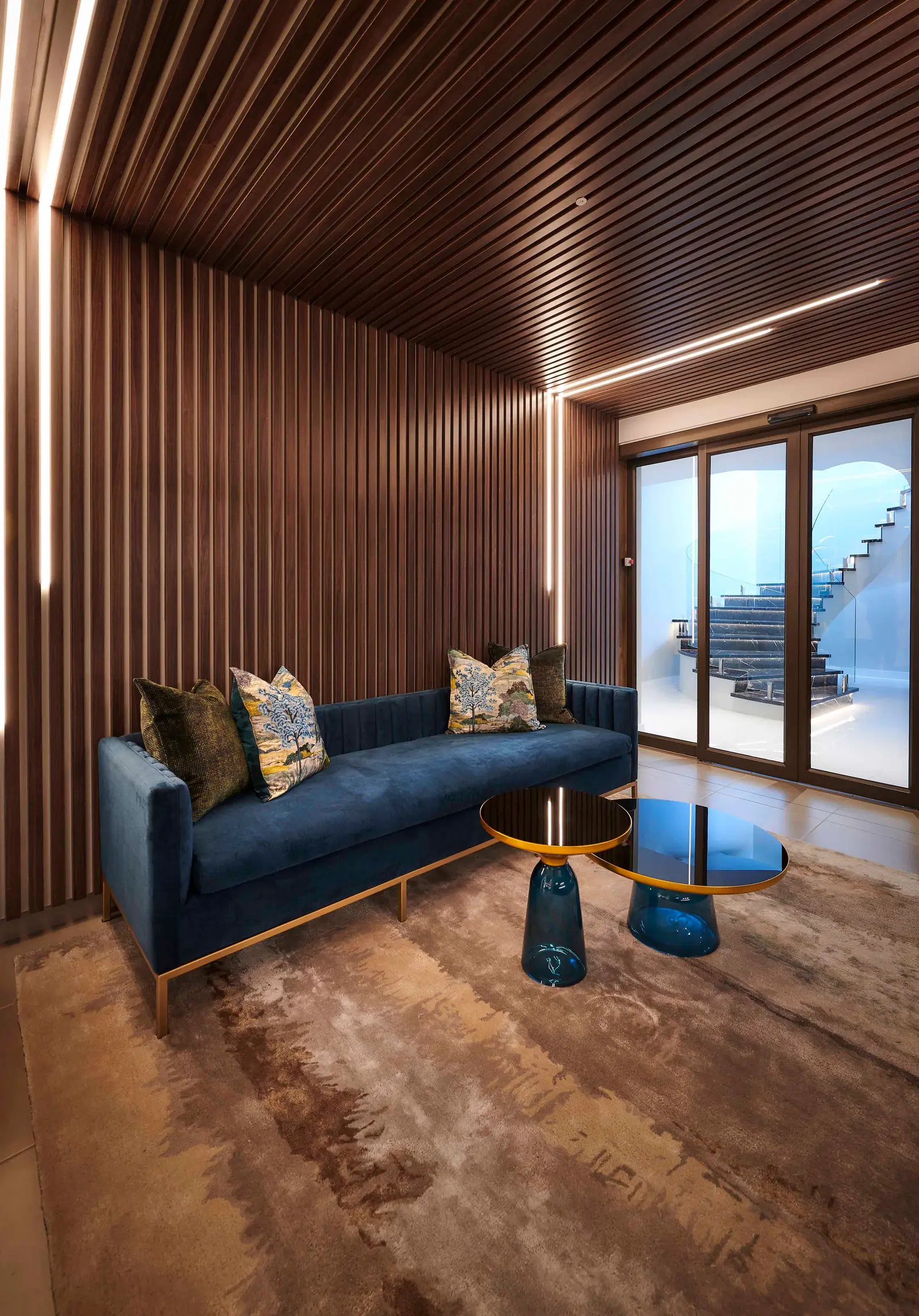 Warm‑toned mancave lounge with seating and artwork curated by Interior Designer Johannesburg.