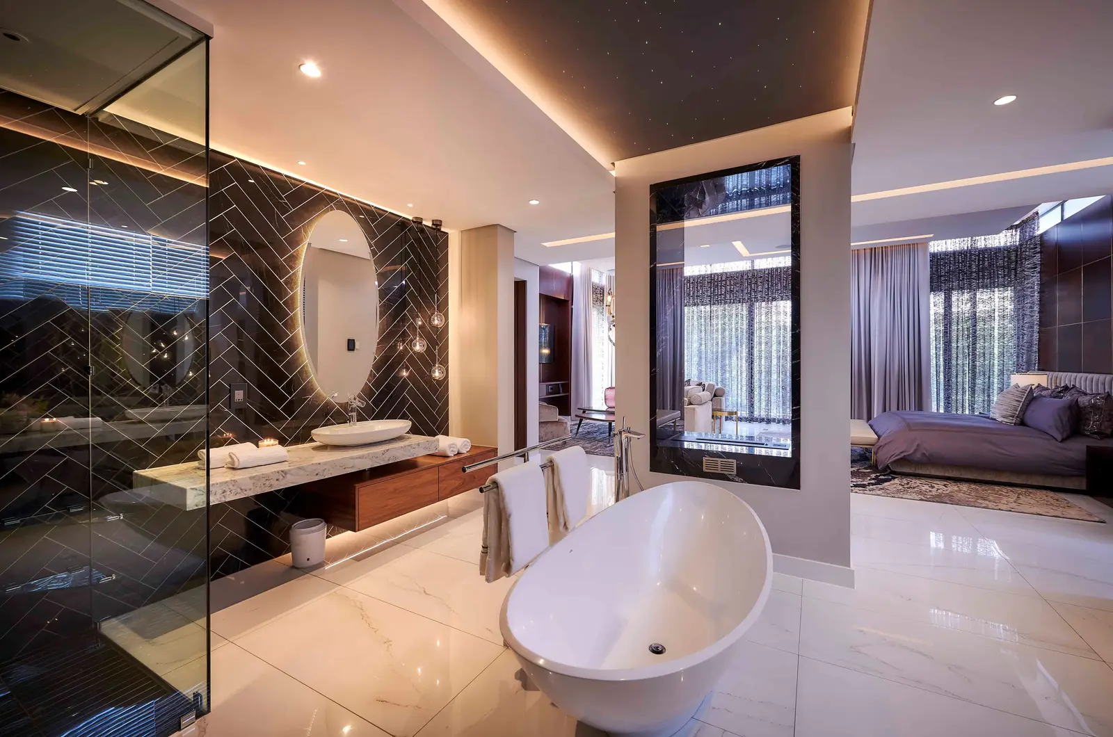 Luxurious bathroom vanity with vessel sink, dark tile backdrop and refined finishes by Interior Designer Johannesburg.