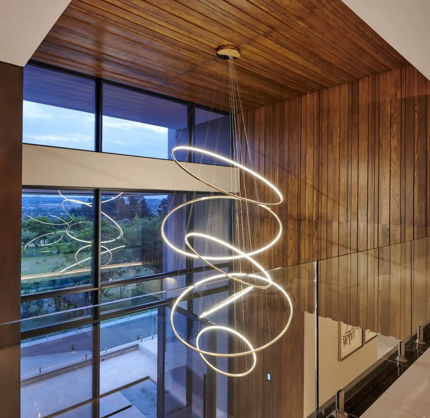 Interior space with layered feature lighting